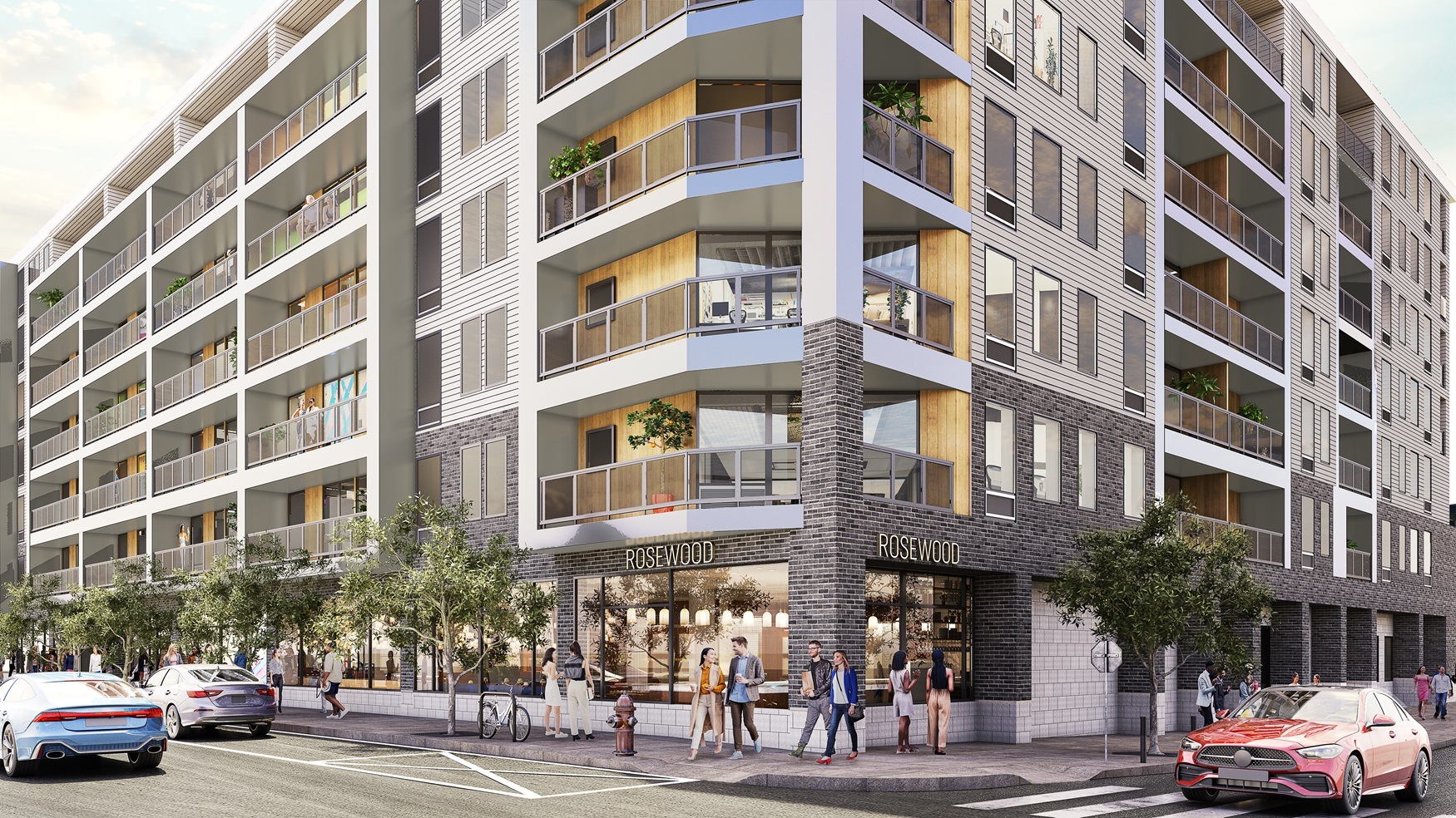 A modern apartment building with the name "Rosewood" on the front.